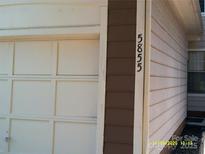 A charming home exterior showing the garage and address number at 5855 Amity Springs Dr, Charlotte, NC 28212