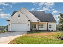 Charming single-Gathering home featuring a two-car garage and classic architectural style at 150 Autumn Blaze Rd, China Grove, NC 28023