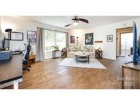 Bright living room with modern decor and plenty of natural light at 2620 Park Rd # F, Charlotte, NC 28209
