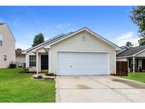 Charming single-Gathering home with a well-maintained lawn and attached two-car garage at 1628 Sandpiper Dr, Rock Hill, SC 29732
