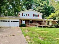 Charming two-story home with large front yard and attached three-car garage at 2660 Tiffany St, Conover, NC 28613