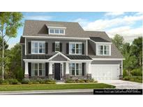 Charming two-story home featuring stylish gray siding, complementary black shutters and covered front porch at 3082 Tramore Dr, Harrisburg, NC 28075