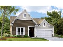 New construction two-story home with attached two-car garage, and a manicured lawn with landscape at 6400 Fairfax Ct, Maiden, NC 28650