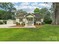 Charming one-story home featuring a cozy front porch and well-manicured lawn at 3770 Buck Point Rd, Catawba, NC 28609