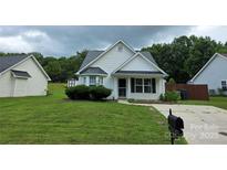 Charming single-Gathering home with a well-manicured lawn and mature landscaping at 3320 Hunting Wood Ct, Gastonia, NC 28052