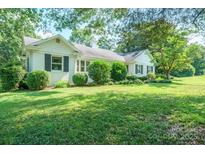 Charming one-story home featuring a landscaped yard and classic architectural details at 630 4Th Nw Ave, Hickory, NC 28601