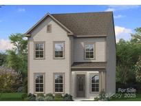 Charming two-story home with symmetrical windows and a covered front porch, set in a landscaped yard at 3111 Middle St # 93, Charlotte, NC 28278