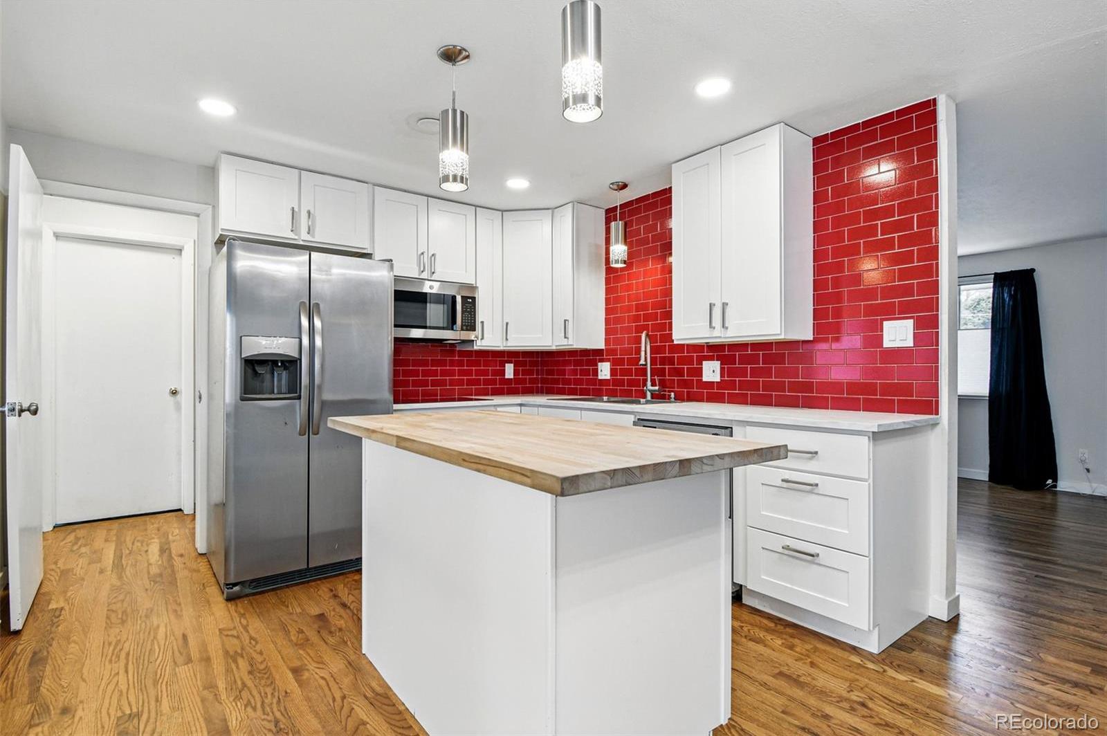 Photo one of 6948 W 70Th Ave Arvada CO 80003 | MLS 4695156