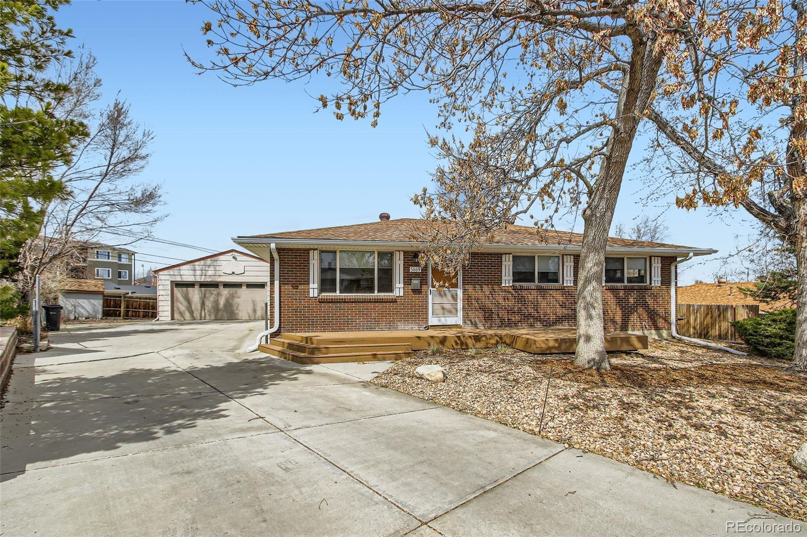 Photo one of 5669 Johnson Ct Arvada CO 80002 | MLS 5402897