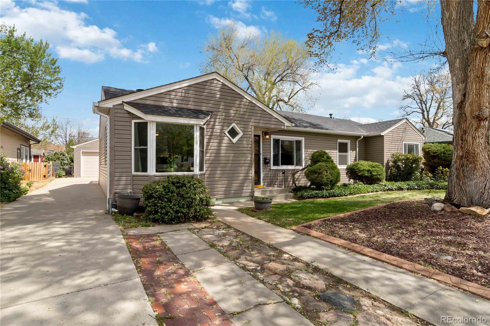 Photo one of 4550 Zephyr St Wheat Ridge CO 80033 | MLS 6884717