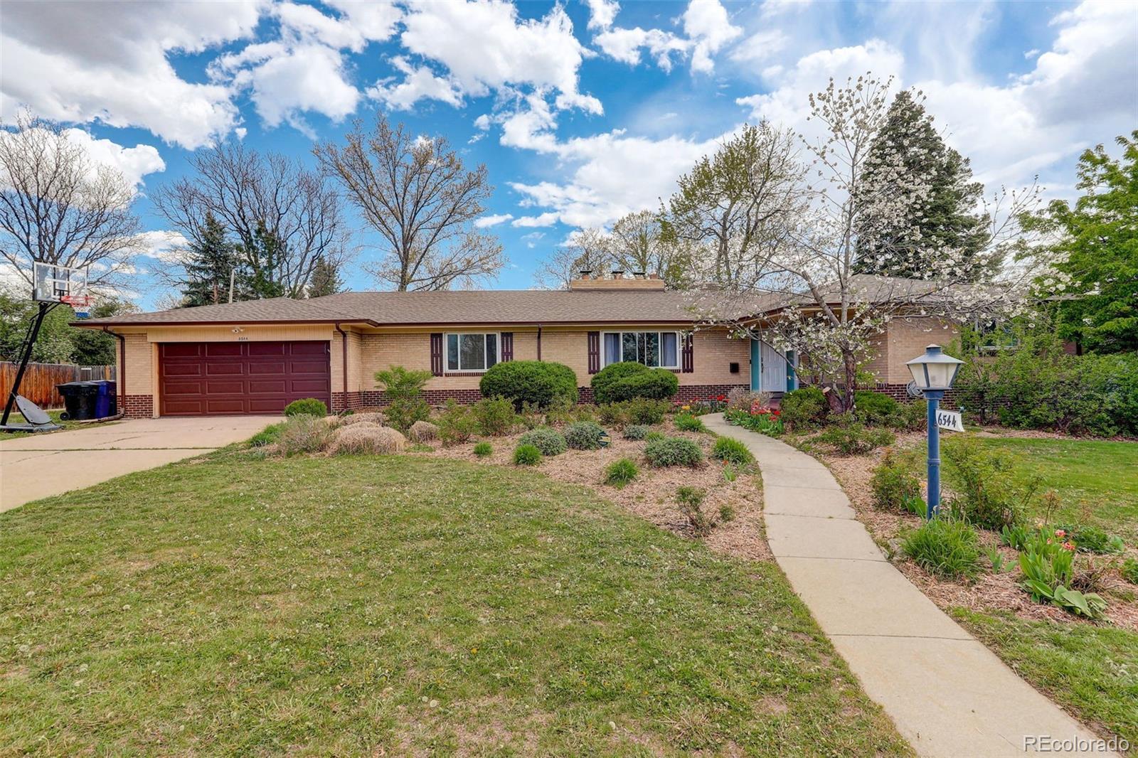 Photo one of 6544 E Alaska Dr Denver CO 80224 | MLS 6977229