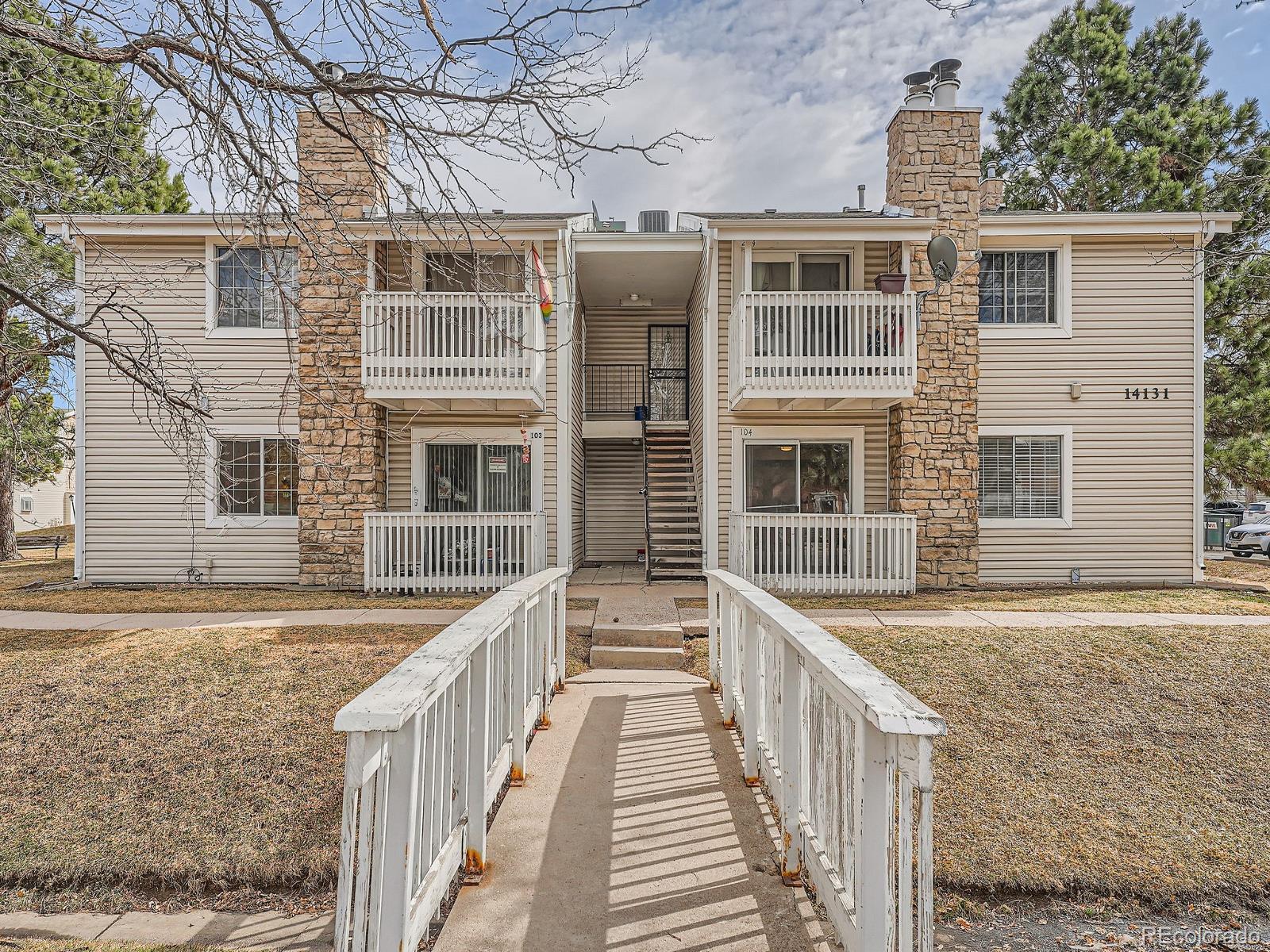 Photo one of 14131 E Jewell Ave # 104 Aurora CO 80012 | MLS 9876343