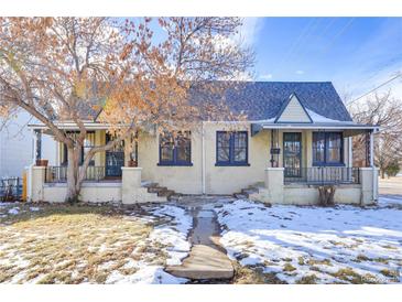 Attractive duplex with a well-maintained front yard, showcasing curb appeal at 2101 S Lafayette St, Denver, CO 80210