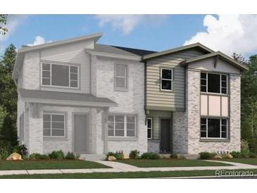 New two-story home features stone accents, neutral siding, complementary trim, professionally landscaped yard and modern design at 3865 W 82Nd Ln, Westminster, CO 80031