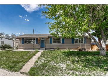 Charming single-story home featuring blue shutters and a well-maintained front yard at 7301 Dale Ct, Westminster, CO 80030