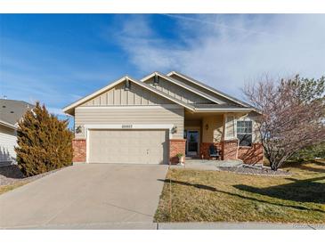 Beautiful Ranch style home with attached two-car garage and landscaped yard at 20697 E Lake Ave, Centennial, CO 80016