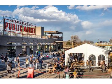 Vibrant scene at Edgewater Public Market; a popular community gathering spot with diverse vendors at 1634 N Sheridan Blvd # 101, Denver, CO 80204