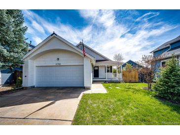 Charming single-Gathering home with a two-car garage and a well-manicured lawn in a friendly neighborhood at 21743 Farmingdale Ct, Parker, CO 80138