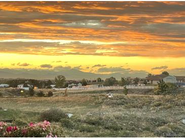 This community has views of mountains and sunsets at 6805 Zebra Grass Ln, Parker, CO 80138