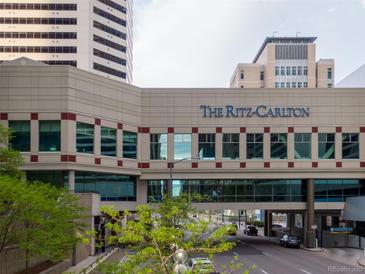 Exterior view of The Ritz-Carlton with its signage and surrounding city street at 1891 Curtis St # 1820, Denver, CO 80202