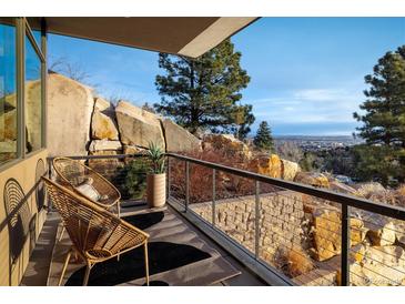 Relaxing balcony with mountain views and stylish seating at 825 Circle Dr, Boulder, CO 80302