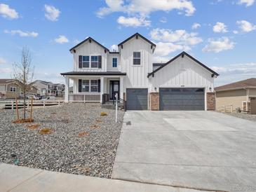 Charming two-story home with a three-car garage and modern farmhouse-style elevation at 4741 Twelve Oaks Way, Castle Rock, CO 80104