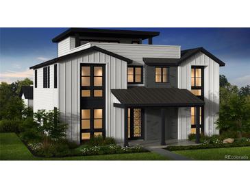 Modern farmhouse exterior with white siding, black trim, and stylish windows, showcasing a contemporary design at 2778 Utica St, Denver, CO 80212