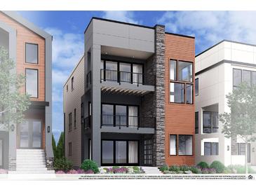Modern three-story home with stone and wood accents, balconies, and stylish architectural details at 16599 Peak Way, Broomfield, CO 80023