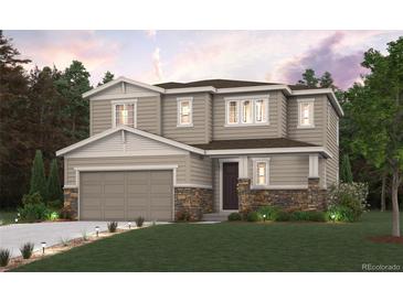 Two-story house with stone accents and a two-car garage at 1290 Loraine N Cir, Lafayette, CO 80026