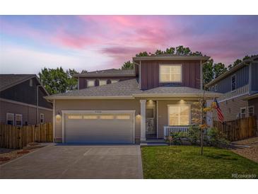 Charming home featuring a well-manicured lawn and a spacious two-car garage, perfect for suburban living at 7933 Florado St, Denver, CO 80221