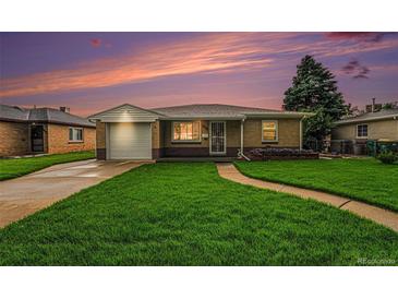 Charming single-story home with a well-manicured lawn and inviting curb appeal, perfect for a cozy lifestyle at 2321 Lima St, Aurora, CO 80010