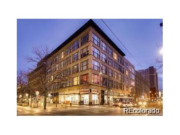 Attractive exterior view of the building at dusk with street view and pedestrian activity at 720 16Th St # 513, Denver, CO 80202