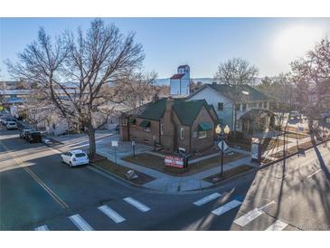 Charming brick building featuring unique architectural details and visible 