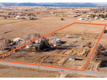 Gorgeous aerial view of the property outlining a lush, expansive lot with well-maintained landscaping at 3428 W County Road 4, Berthoud, CO 80513