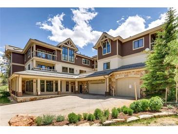 Beautiful multi-level home with covered parking and landscaped front yard, perfect for mountain living at 655 Four Oclock Rd # 204, Breckenridge, CO 80424