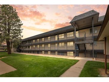 Inviting multi-Gathering home boasting brick facade, landscaped grounds, and outdoor living space at 1723 Robb St # 43, Lakewood, CO 80215