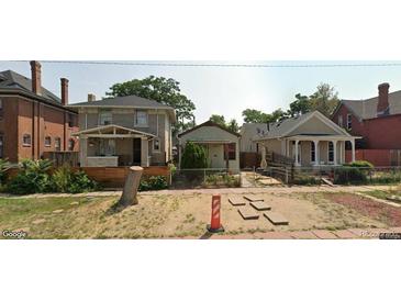 Three charming houses with unique architectural details and well-maintained yards at 1038 Mariposa St, Denver, CO 80204