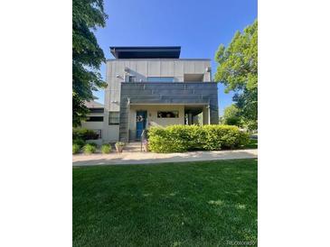 Modern home featuring a manicured lawn and contemporary architectural design at 2898 W 22Nd Ave, Denver, CO 80211