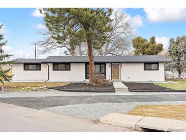 Inviting single-story home with a new roof, fresh exterior paint, and attractive landscaping showcasing its curb appeal at 2505 Upham St, Lakewood, CO 80214