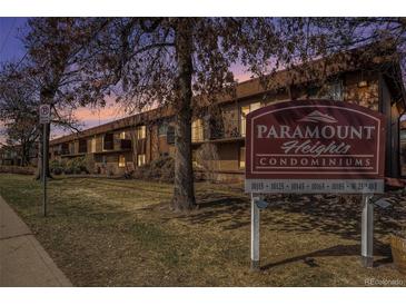 Paramount Heights Condominiums sign and building exterior at sunset at 10115 W 25Th Ave # 1, Lakewood, CO 80215