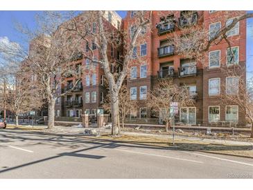 Brick building exterior, tree-lined street, city view at 1630 N Clarkson St # 320, Denver, CO 80218