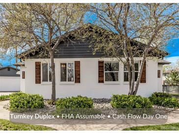 Charming home with lush greenery and mature trees, showcasing its inviting curb appeal and well-maintained exterior at 6133 S Sterne Cir, Littleton, CO 80120