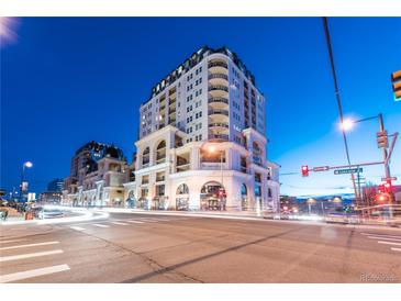 Elegant high-rise building at night, showcasing architectural details and city views at 975 N Lincoln St # 15A, Denver, CO 80203