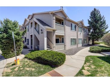 Multi-level condo building featuring maintained landscaping, private entrances, and a welcoming community feel at 1016 Opal St # 102, Broomfield, CO 80020