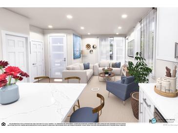 Bright living room featuring neutral furnishings and stylish decor at 1606 W 166Th Ave, Broomfield, CO 80023