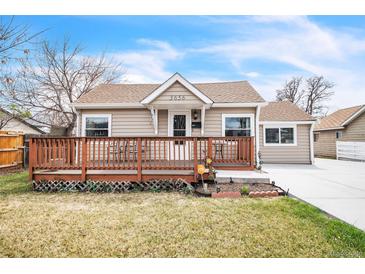 Charming single-story home featuring a cozy front porch and well-maintained lawn at 3656 W 77Th Ave, Westminster, CO 80030