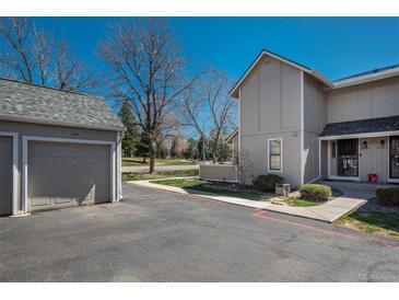 Inviting townhouse featuring an attached one-car garage and well-maintained landscaping in a desirable location at 2699 S Xanadu Way # A, Aurora, CO 80014