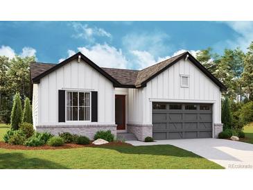 Charming one-story home with white vertical siding, black trim, and a gray garage door at 7014 E 126Th Dr, Thornton, CO 80602