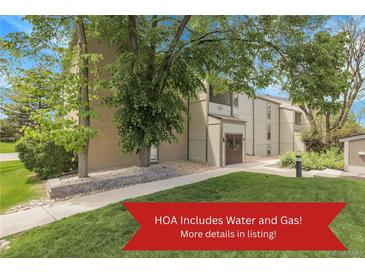 Charming condo complex with well-maintained lawns and mature shade trees offers a welcoming curb appeal at 7318 S Xenia Cir # B, Centennial, CO 80112