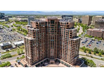 Stunning high-rise building featuring elegant brickwork and expansive windows showcasing panoramic city views at 8100 E Union Ave # 712, Denver, CO 80237